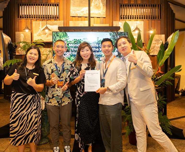 Pelago team celebrating at Mandai Wildlife Reserve