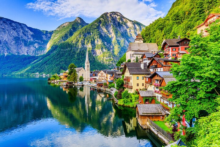 Discover the charm of Hallstatt where historic buildings meet stunning alpine scenery and enjoy a fascinating journey through 7000 years of salt mining history in this picturesque setting.