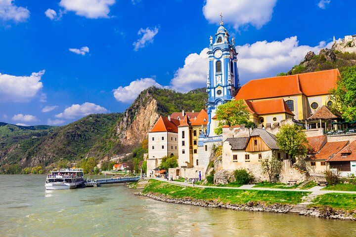 Experience stunning views of charming riverside architecture including historic buildings and lovely landscapes while navigating the serene waters of the Danube during this unique tour of Vienna.