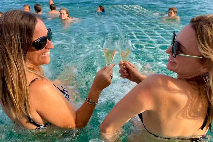 Ladies enjoying a swim in the boom net