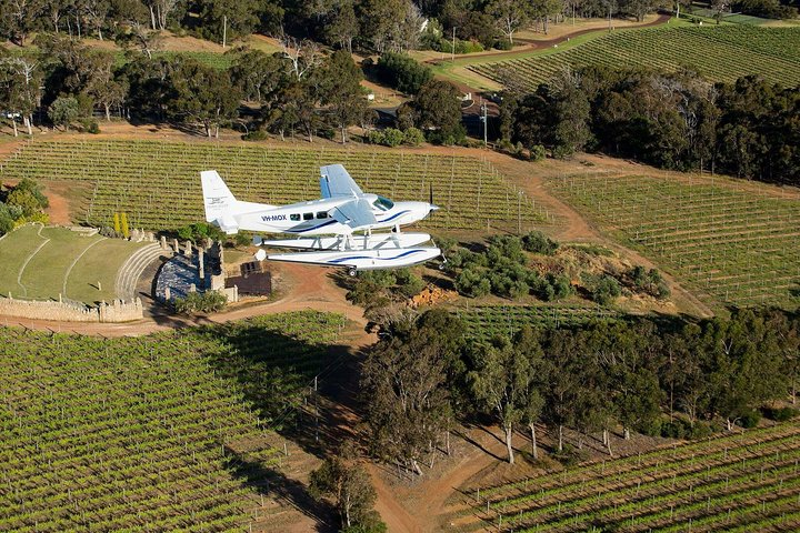 Soar above stunning vineyards and rugged coastlines indulging in exquisite wines and gourmet flavors on an unforgettable journey through Margaret River's scenic landscape.