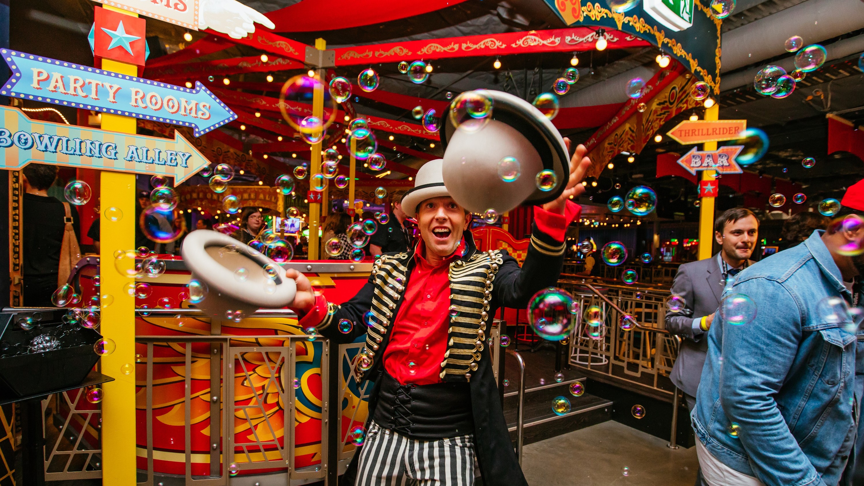 Step into a whimsical wonderland filled with enchanting games lively performers and nostalgic fun perfect for family bonding and creating lasting memories at Archie Brothers Cirque Electriq in Sydney.