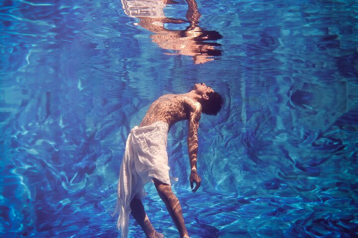 Experience the fusion of ancient stories and modern expression as you witness Bangarra Dance Theatre's powerful performances showcasing the richness of Australian Indigenous culture in an iconic setting.