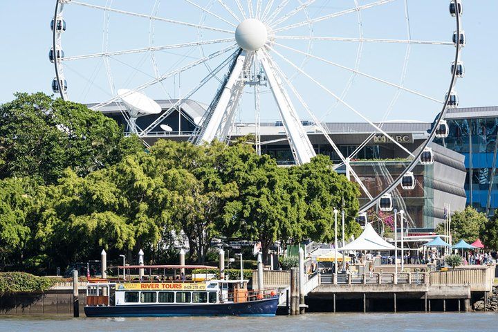 Cruise along the Brisbane River soaking in stunning views of the iconic Story Bridge and Brisbane City Center while enjoying live commentary and refreshments. Perfect for relaxation!
