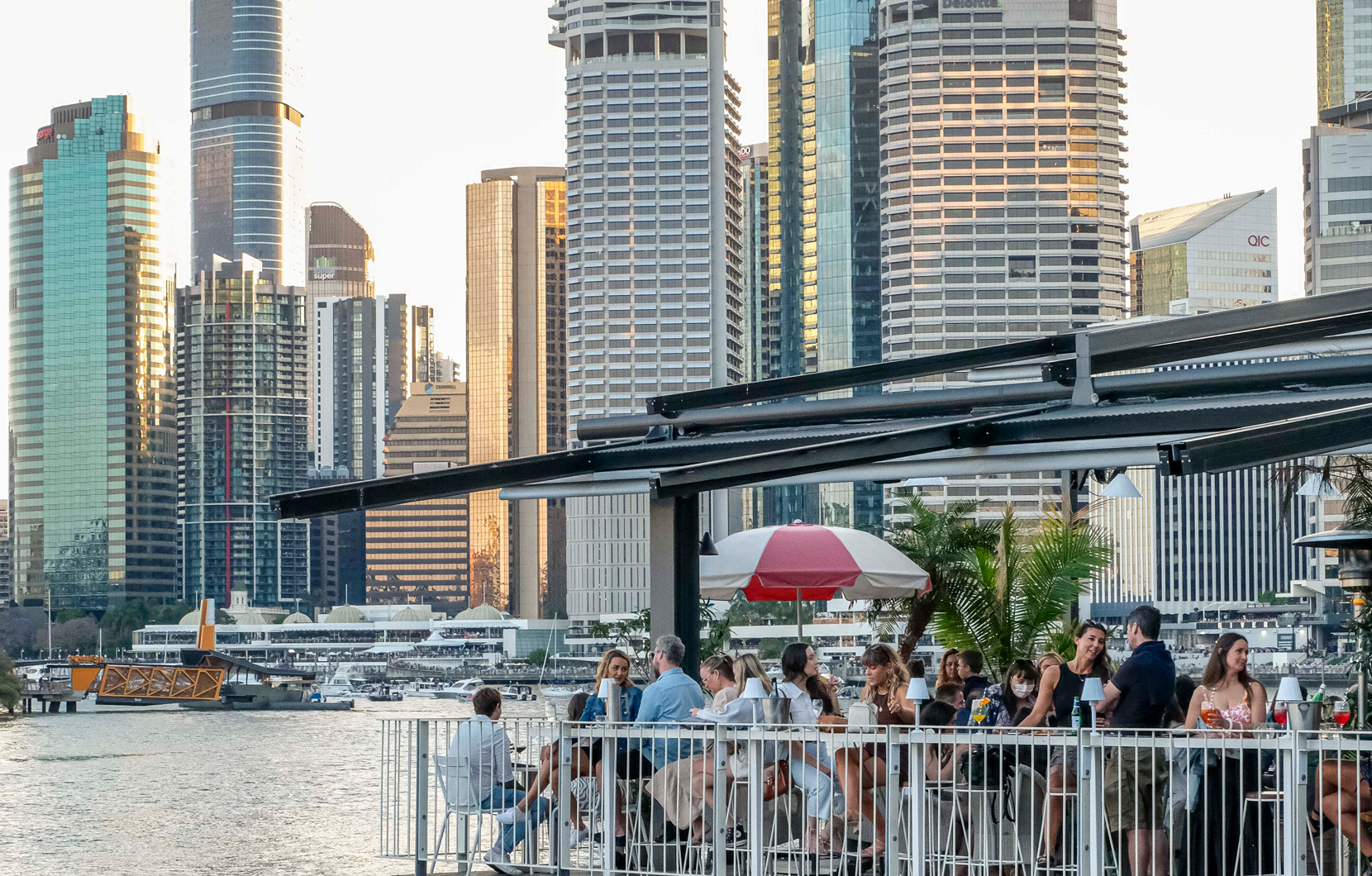 Savor gourmet delights and stunning skyline views while indulging in Brisbane's finest culinary experiences making every moment unforgettable along the picturesque riverfront.