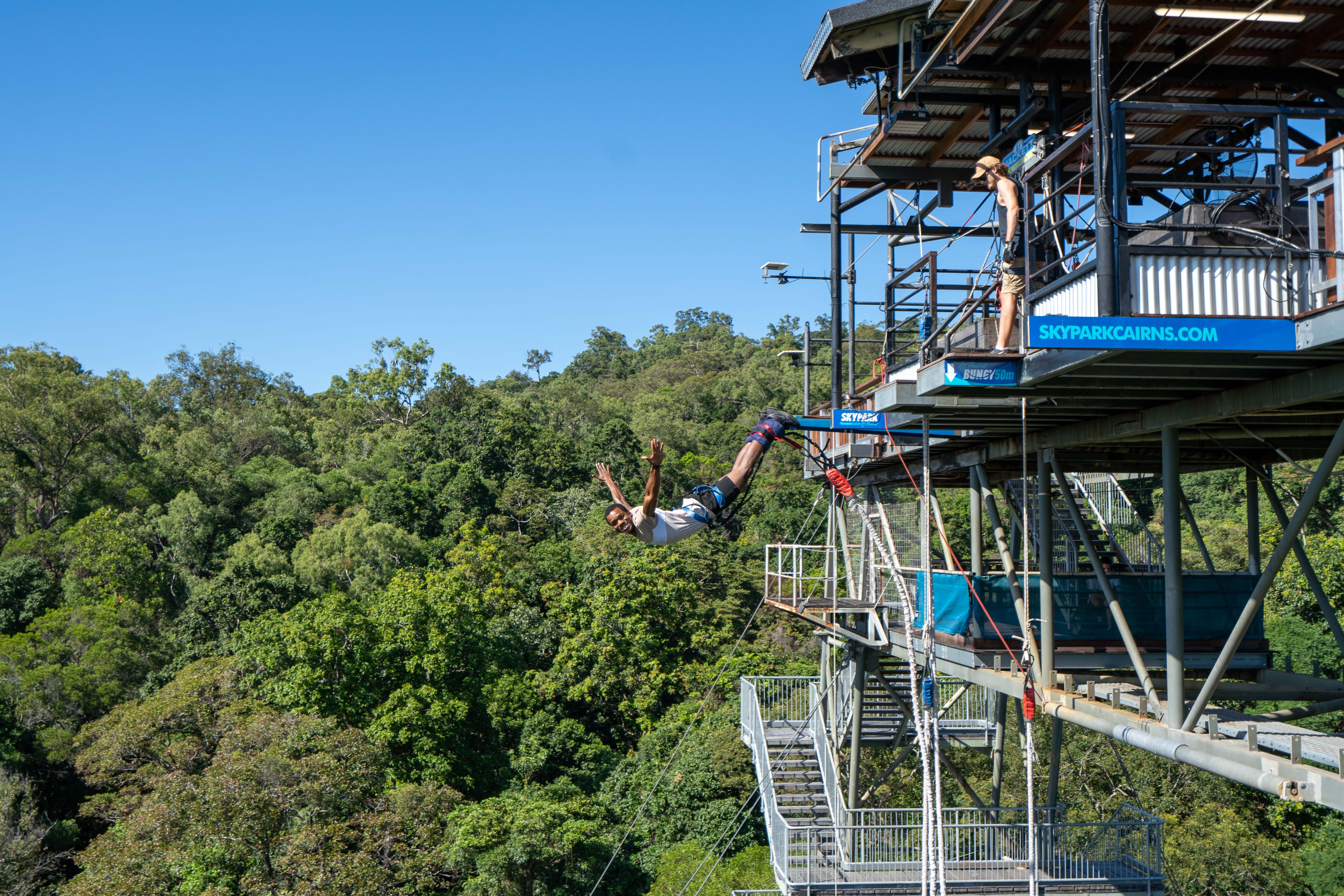 Experience the rush of jumping 50 meters above a lush lagoon surrounded by breathtaking rainforest views. AJ Hackett's Bungy Jump offers unique styles perfect for every adventurer.