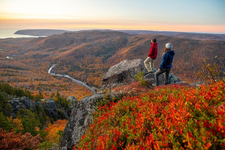 Experience the stunning landscapes of Cape Breton's Cabot Trail with panoramic views colorful fall foliage and memorable stops perfect for capturing the essence of your journey.