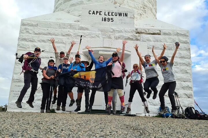 Experience the joy of hiking as you conquer the stunning Cape to Cape Track celebrating the journey with fellow adventurers at the iconic Cape Leeuwin lighthouse.