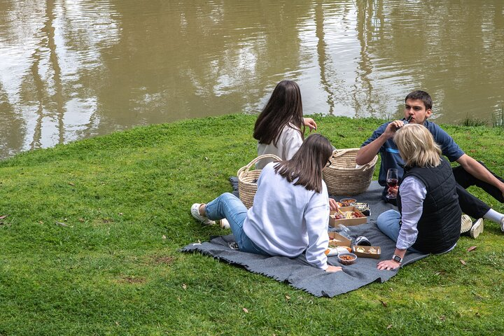 Relax by the tranquil waterside savoring delicious farm-fresh bites and fine wine with loved ones. Experience a delightful picnic at Green Olive where nature and flavor meet.