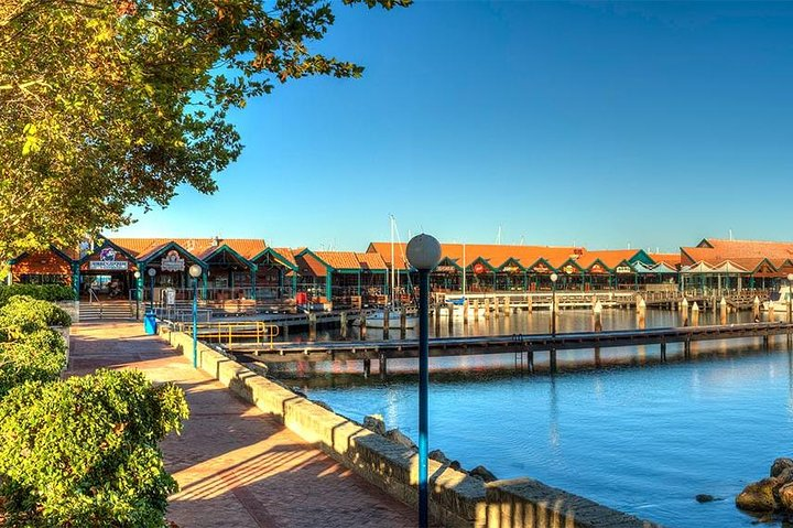 Stroll along the picturesque marina surrounded by charming shops and cafes offering a perfect blend of nature and relaxation in Yanchep National Park. Enjoy the serene waters and lush greenery.