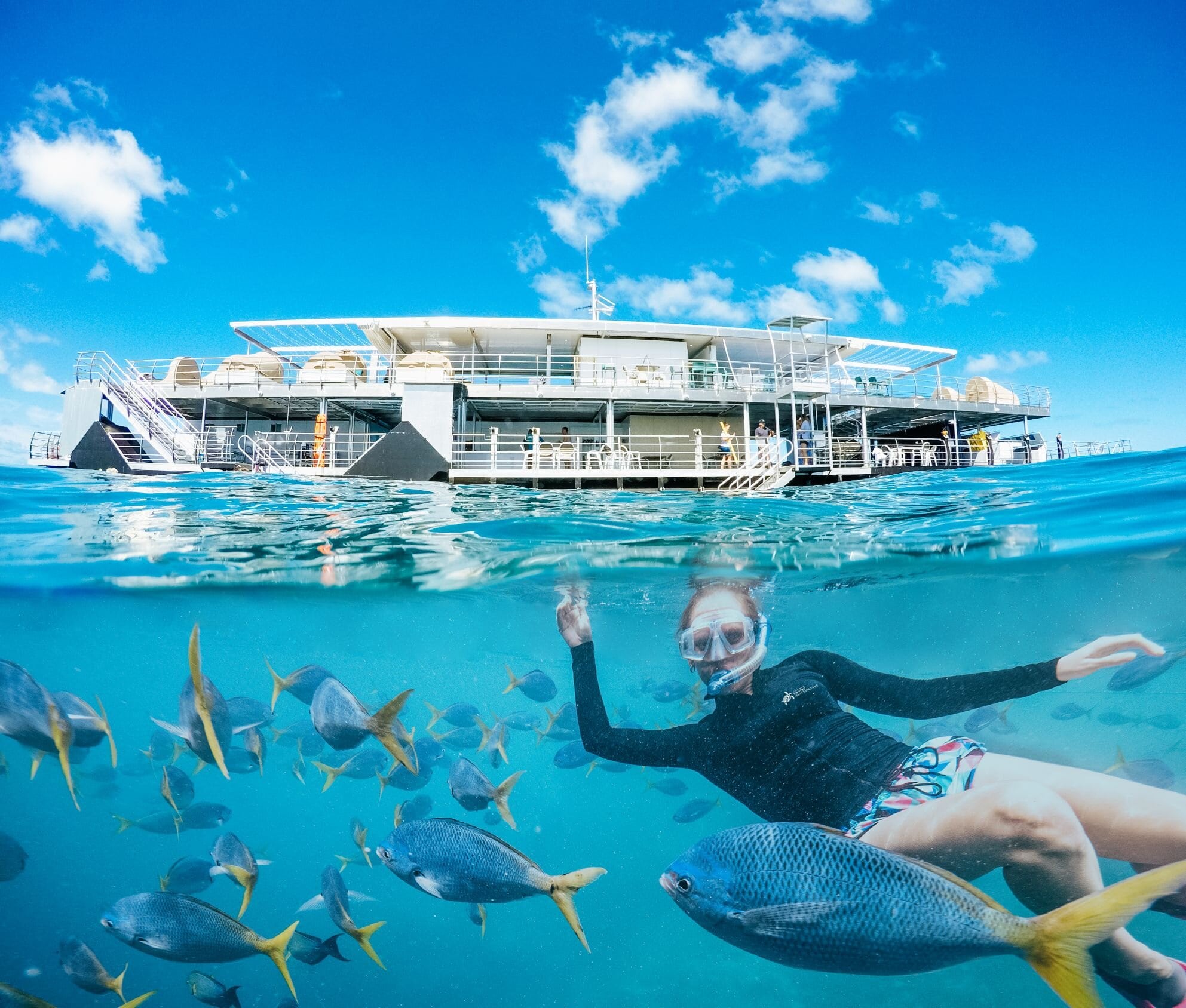 Sail away on a cruise to an exhilarating adventure around Whitsunday Islands, in the heart of the Great Barrier Reef.