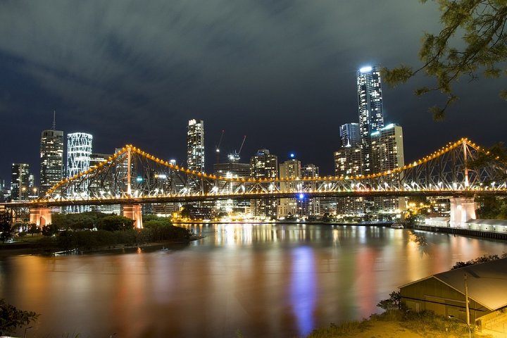 Experience the sparkle of Brisbane at night with twinkling city lights reflected on the river creating the perfect backdrop for a romantic adventure. Discover love in every corner.