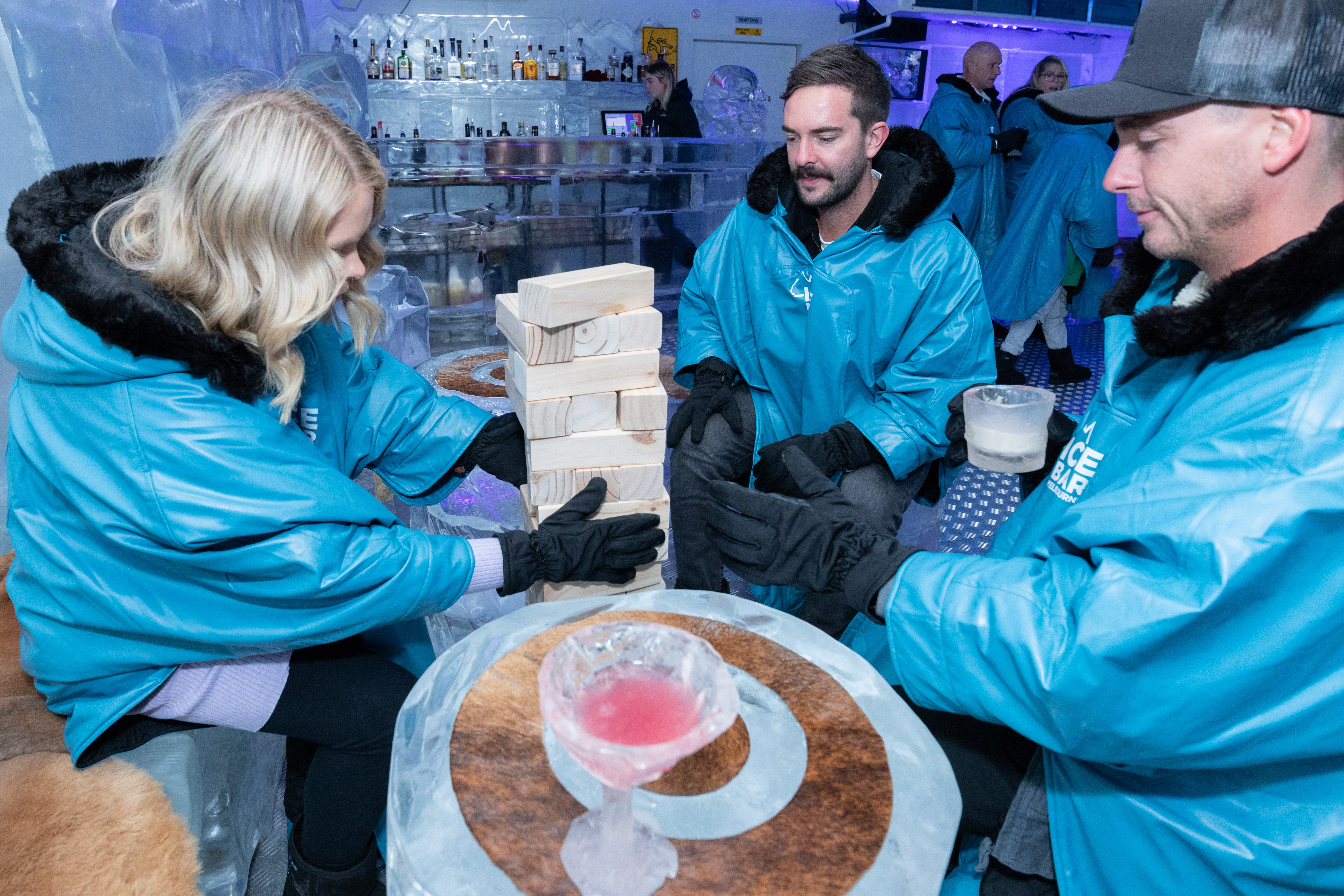 Experience the joy of playful moments as you enjoy ice activities with friends surrounded by stunning ice sculptures and a refreshing chill at Ice Bar Melbourne. Unforgettable family fun awaits!