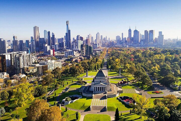 Discover Melbourne's stunning skyline framed by lush gardens where iconic landmarks meet serene green spaces offering an unforgettable journey through the city's unique charm and hidden treasures.