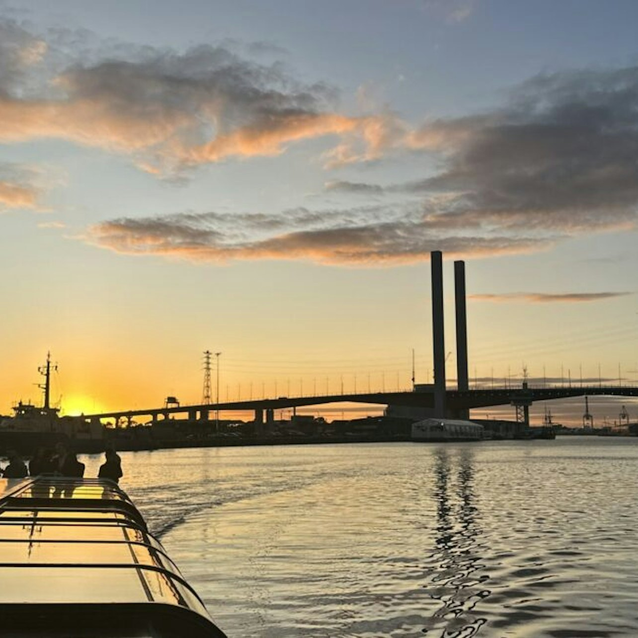 Glide along the tranquil waters as the sun dips below the horizon illuminating Melbourne’s skyline and reflecting on the riverbank—an experience that truly captures the city's charm.