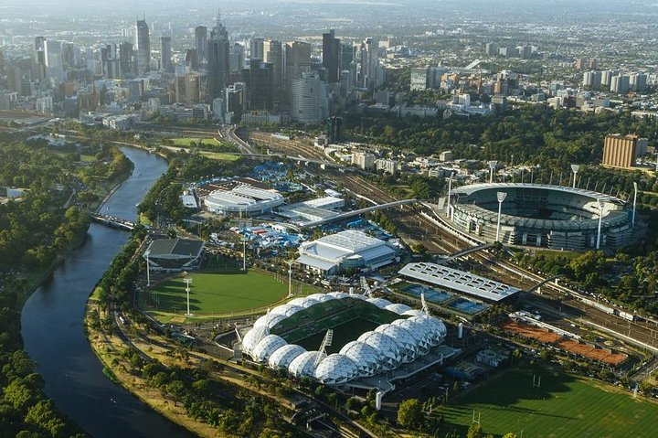 Discover Melbourne's iconic sporting landscape alongside the Yarra River revealing a rich tapestry of sports history that celebrates the spirit of Australian athletics and adventure.