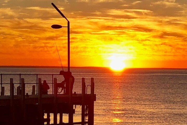 Experience breathtaking sunsets over the water as you unwind on a private tour. Embrace tranquil moments while exploring the picturesque coast and capturing unforgettable memories with friends.