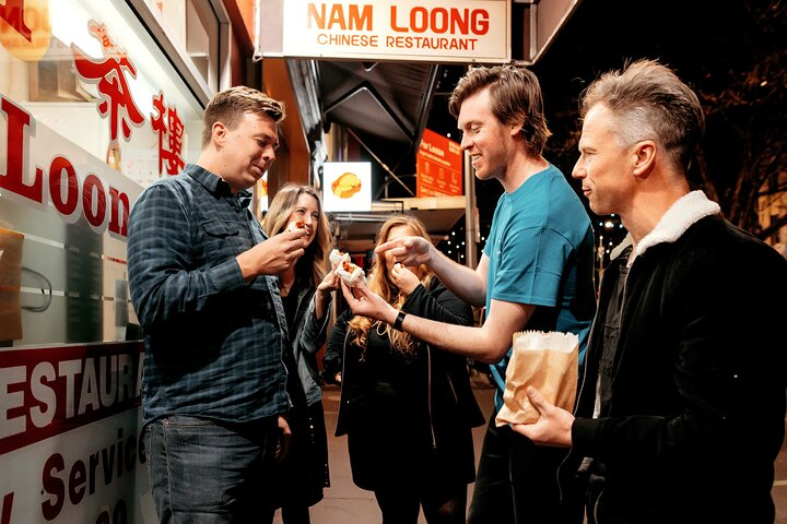 Sharing steamed buns outside a Melbourne Chinatown institution