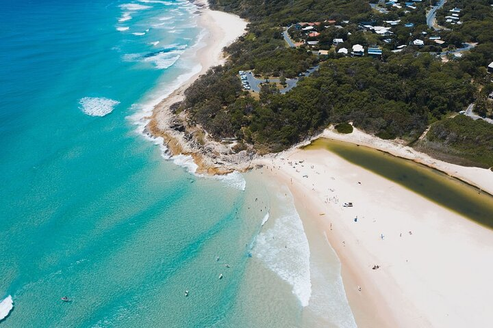 Pristine shores and shimmering waters invite exploration on North Stradbroke Island. Dive into a day of wildlife watching scenic walks and relaxing on beautiful beaches.