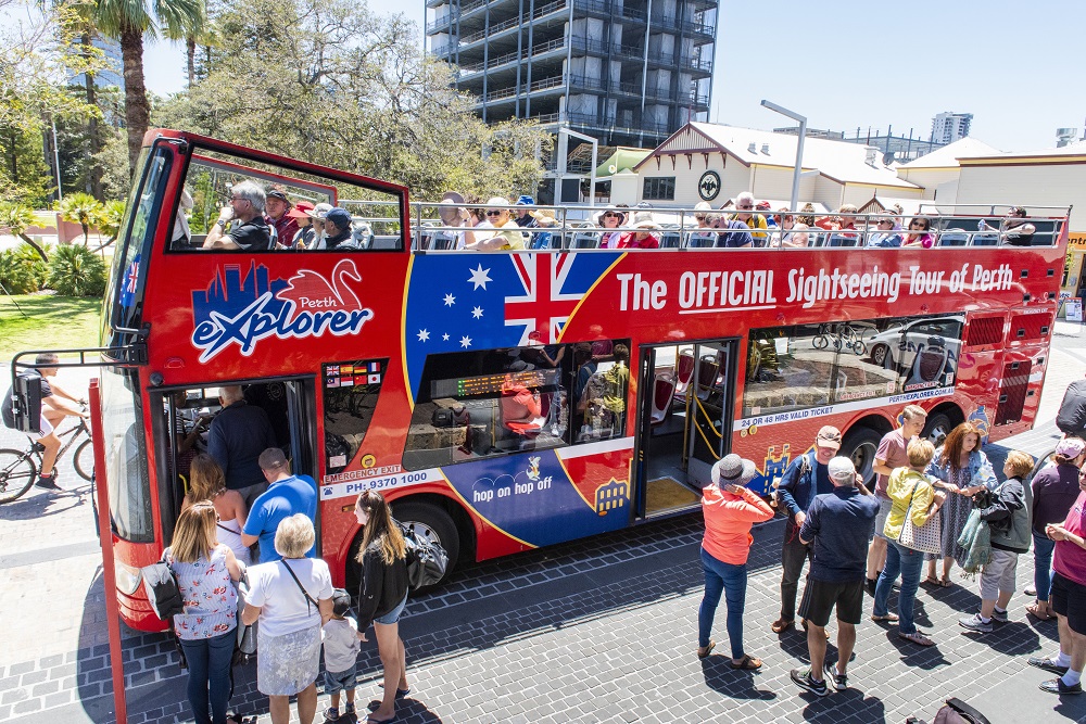 Experience the charm of Perth with breathtaking views from the top deck of an open-top bus capturing stunning sights and creating lasting memories throughout this scenic journey.