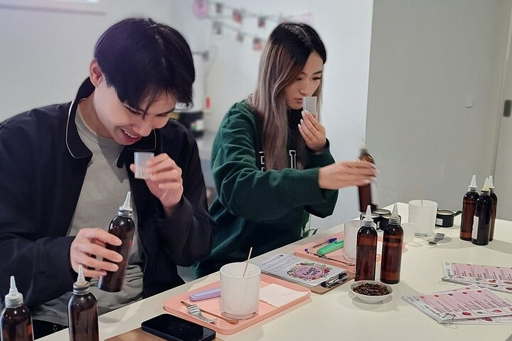 Craft your own unique candle fragrance while enjoying a hands-on candle-making session surrounded by a warm and inviting workshop atmosphere perfect for creating lasting memories.