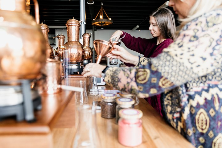 Immerse yourself in the world of gin as you craft your own unique blend experimenting with an array of botanicals in a charming setting that's perfect for hands-on creativity.