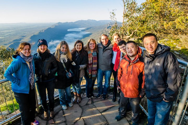 Experience the stunning panoramas of Grampians National Park where friendly travelers gather to explore breathtaking viewpoints and lush landscapes while keeping an eye out for native wildlife.