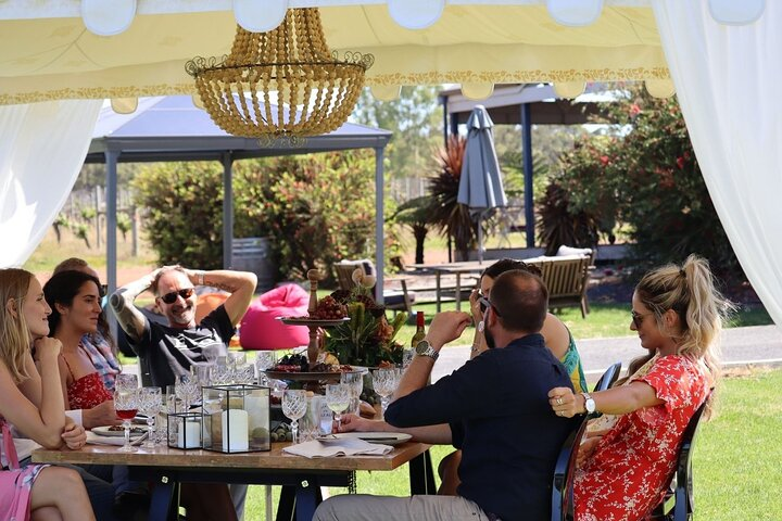 Indulge in an unforgettable wine journey at Margaret River sipping exceptional wines while enjoying delightful cheese boards amidst stunning winery views and engaging stories from the passionate winemaker.