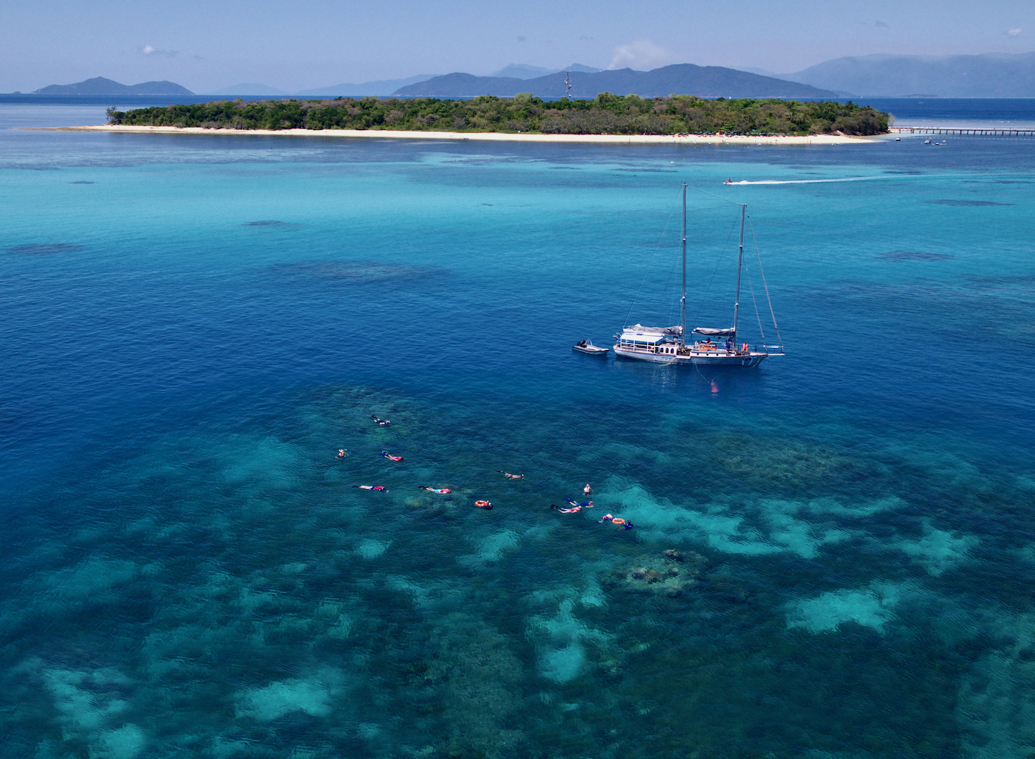Discover the wonders of the Great Barrier Reef and Green Island as you snorkel amidst stunning coral gardens and relax on pristine beaches all while enjoying a personal sailing experience.
