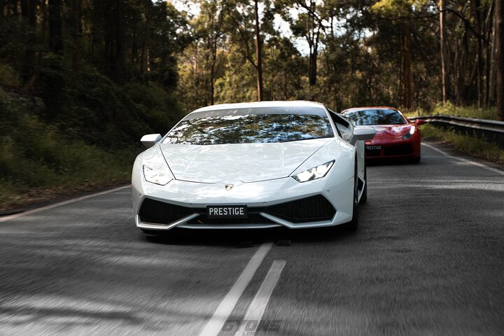 Experience the thrill of driving iconic supercars through the stunning landscapes of Yarra Valley with breathtaking views and winding roads that promise excitement at every turn.