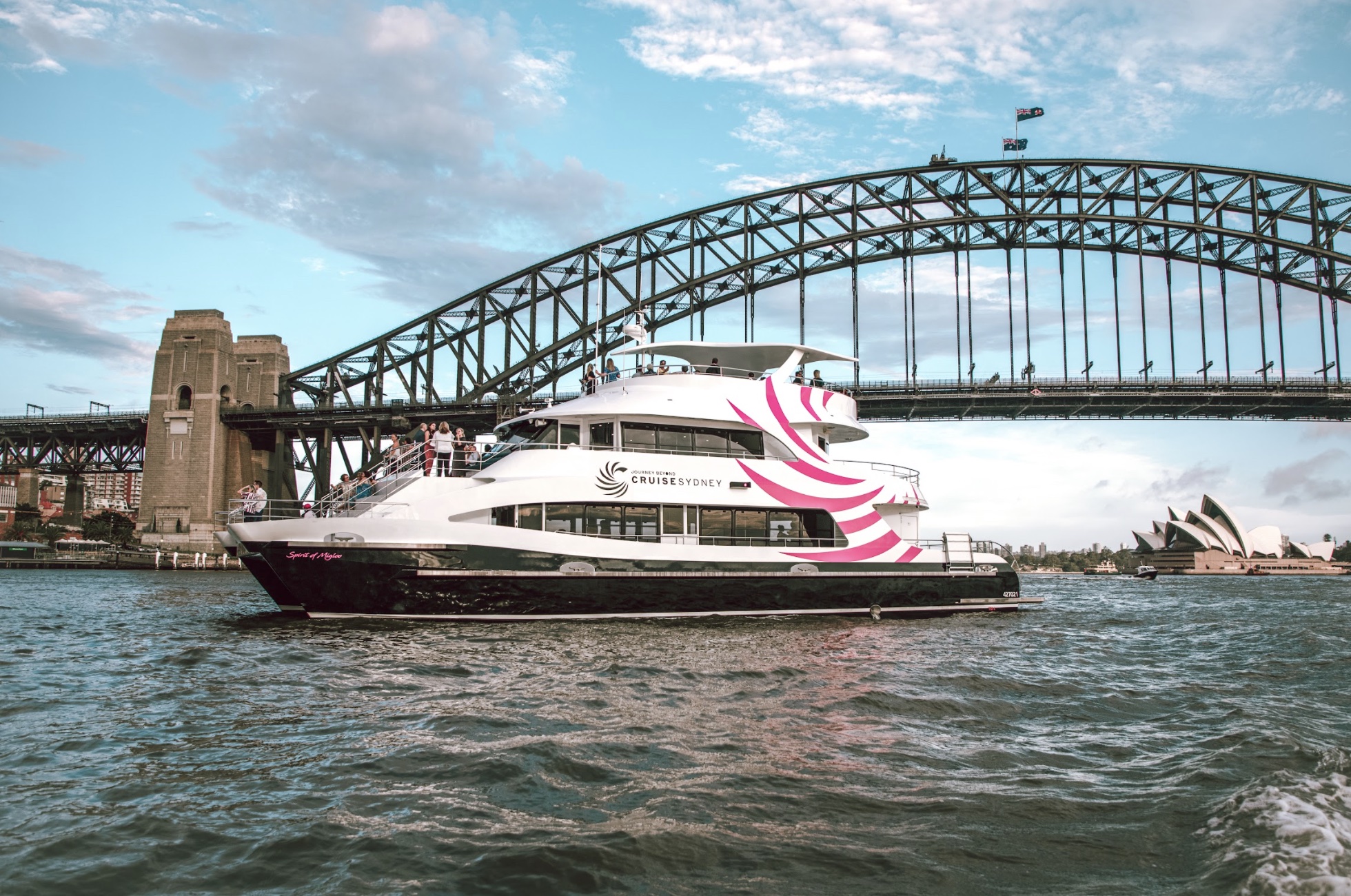 Experience the stunning sights of Sydney Harbour aboard a luxurious vessel savoring a chef-designed dinner while cruising past iconic landmarks like the Sydney Opera House and Harbour Bridge.