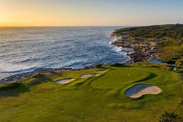 Discover the hidden gems of Sydney as you stroll along stunning coastal views showcasing the breathtaking beauty of sandy shores and rugged cliffs in a unique local experience.