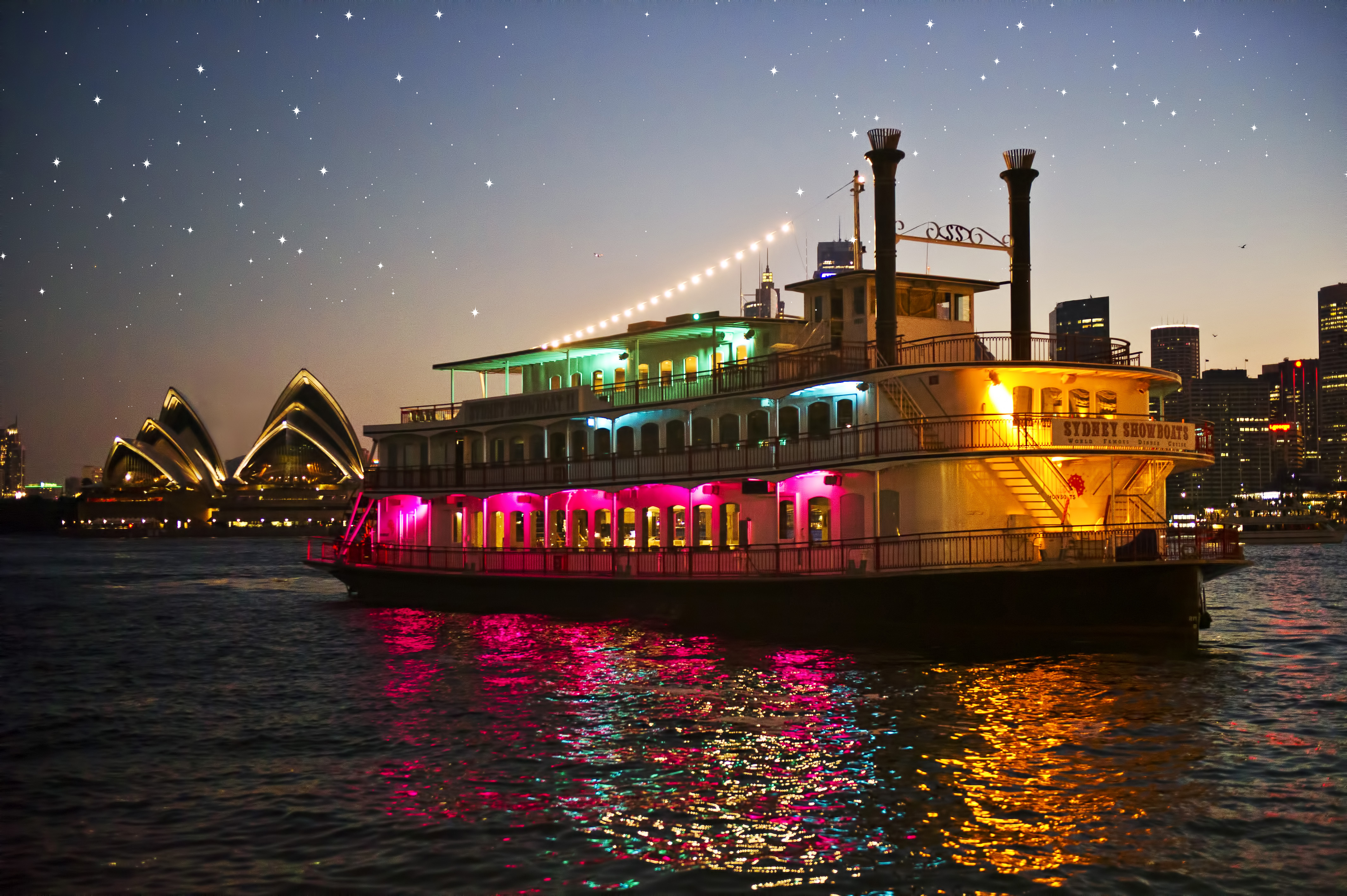Savor a delightful 3-course meal aboard a scenic paddle wheeler while enjoying stunning views of the Sydney Harbour Bridge and Opera House under a starry sky.