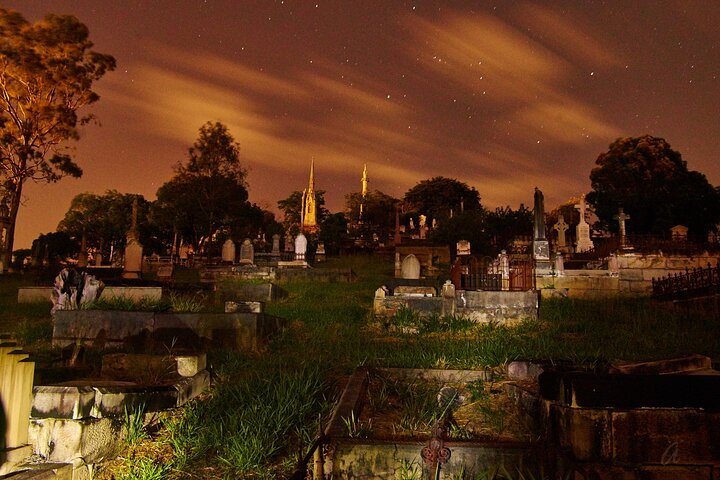 Explore the eerie charm of Toowong Cemetery under a starlit sky where stories of spirits and historic mysteries come to life revealing the secrets of Brisbane’s past.