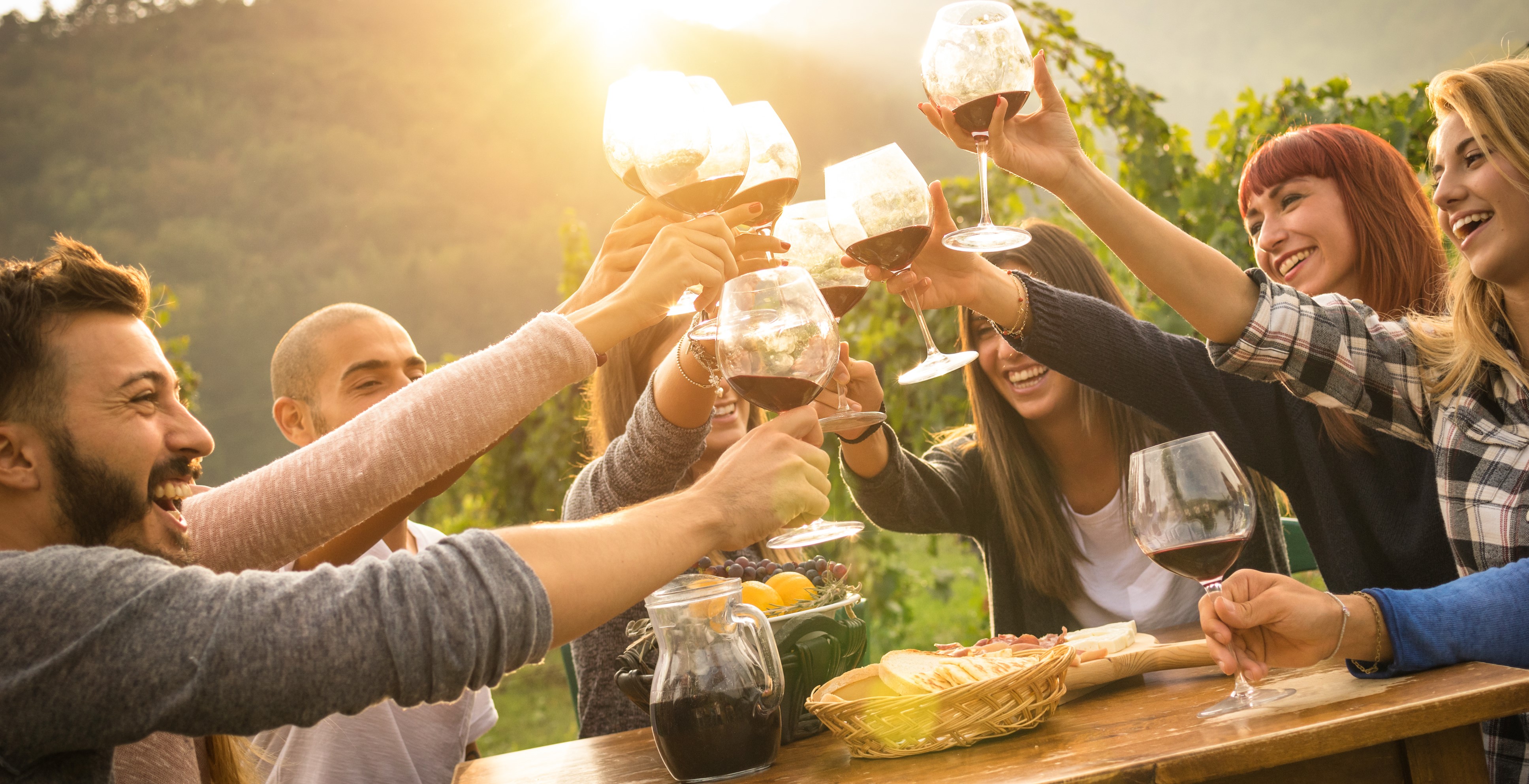 Raise a glass and enjoy delicious wines surrounded by the stunning hills of Yarra Valley where friends gather to savor delightful moments and chocolate treats amidst breathtaking scenery.