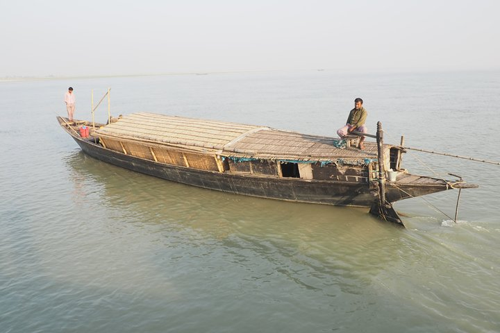 Wooden made engine boat for the adventure on the rivers of Bangladesh 