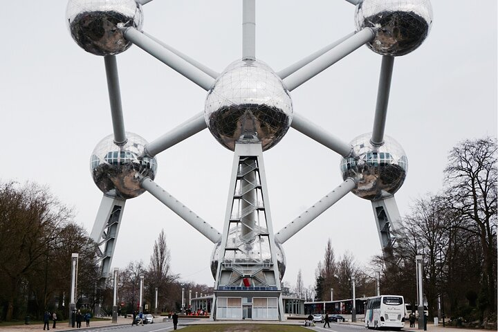 Discover the unique architectural wonder of the Atomium where each sphere offers stunning city views and engaging exhibits celebrating Brussels' rich history and design heritage.
