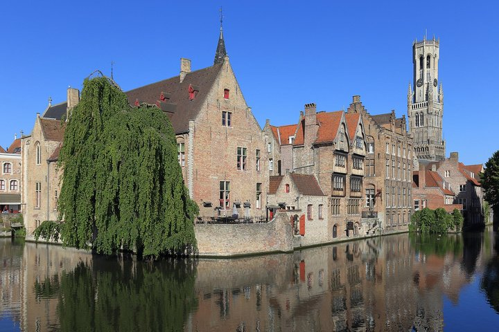 Discover the charm of Bruges with its stunning architecture and serene canals where history whispers from every corner and the Lake of Love beckons for romantic strolls.