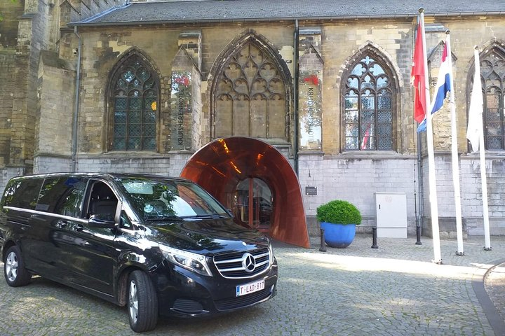 Experience seamless travel from Brussels to Amsterdam in comfort with a private vehicle offering Wi-Fi refreshments and an attentive chauffeur ensuring relaxation as you journey between cities.