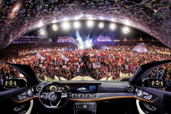 Experience the excitement of Tomorrowland Dreamville in style traveling comfortably from Brussels in a luxury car while immersing in the lively festival atmosphere from your seat.