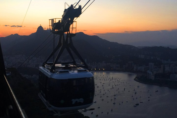 Sugarloaf cable car ride at sunset by Luis Darin