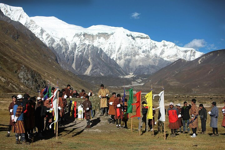 Highlanders playing archery - national sport of Bhutan