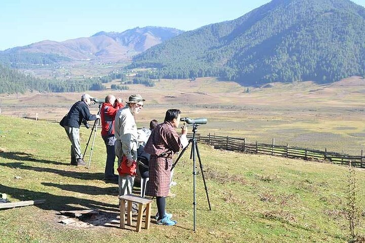 Birdwatchers at Phobjikha valley in western Bhutan