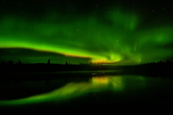 Northern Lights reflecting on the Takhini river