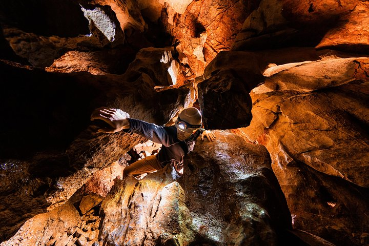 This could be you trying out your new "caving moves" on this Multi-Cave tour.