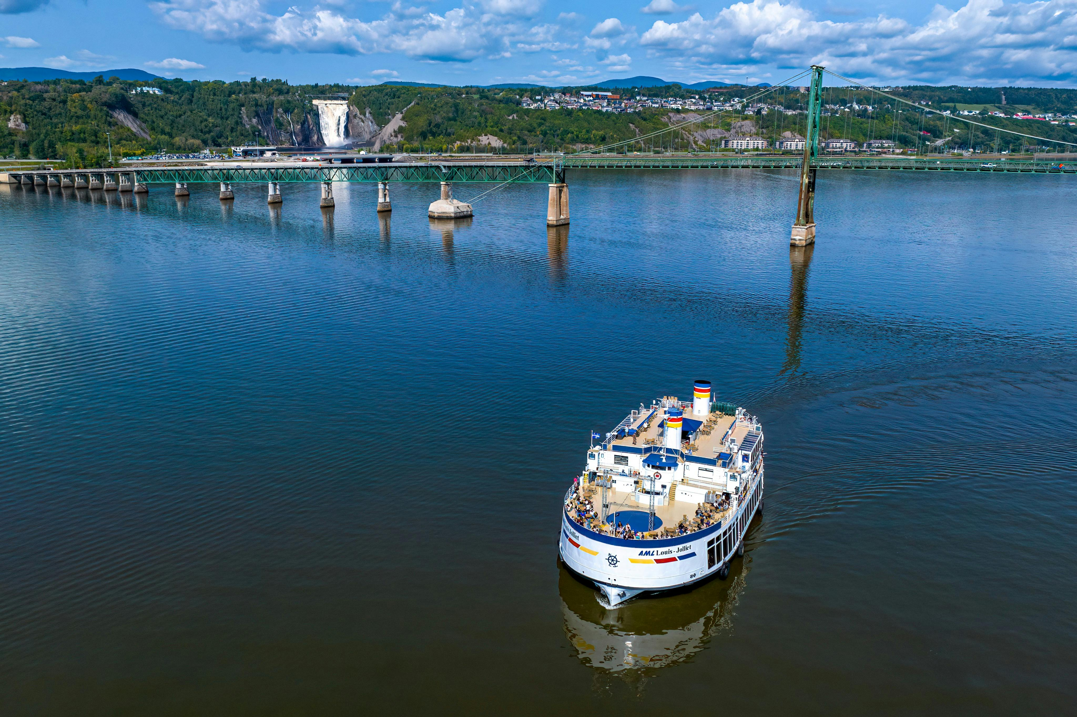 Quebec City: Guided Day Trip from Montreal with Montmorency Falls & Cruise - Photo 1 of 5