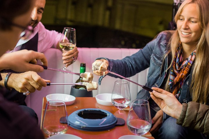 Indulge in a delightful cheese fondue experience while exploring Zurich’s charming streets. Savor each bite with a glass of wine in hand enjoying local stories and scenic views.