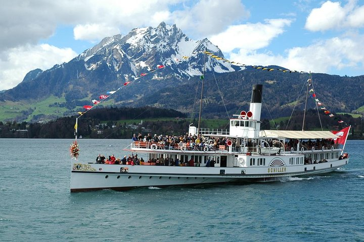 Boat on Lake Lucerne with Mount Pilatus 