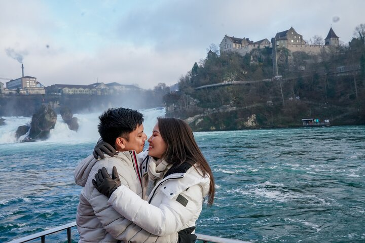 Experience the majestic Rhine Falls alongside a local capturing unforgettable moments and exploring scenic Schaffhausen a charming town steeped in culture and history.