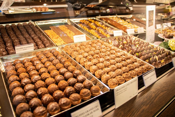 Indulge in a delightful journey through Zurich tasting an exquisite array of chocolates while exploring charming neighborhoods guided by a local uncovering the city’s sweet secrets.